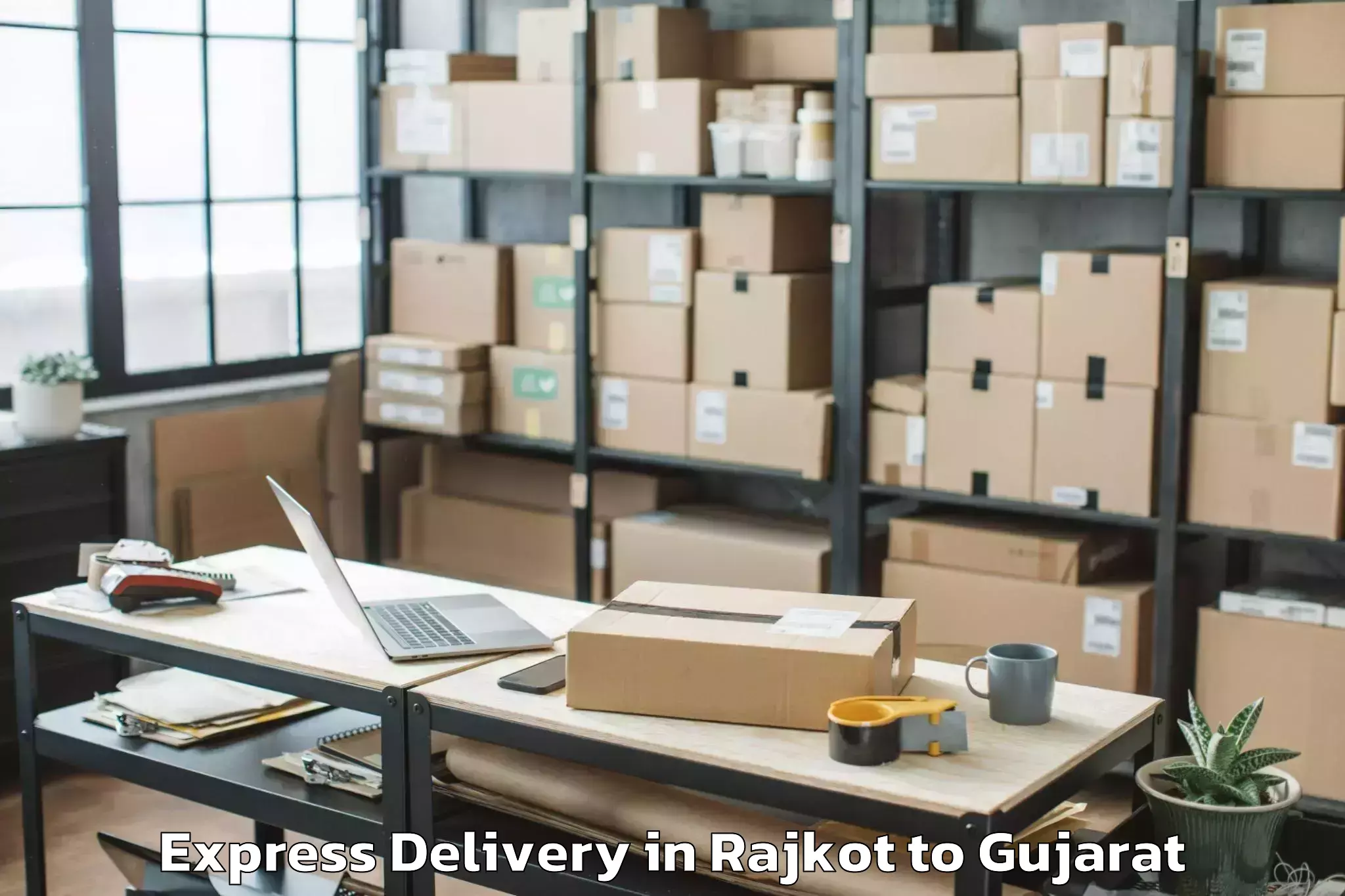 Get Rajkot to Valod Express Delivery